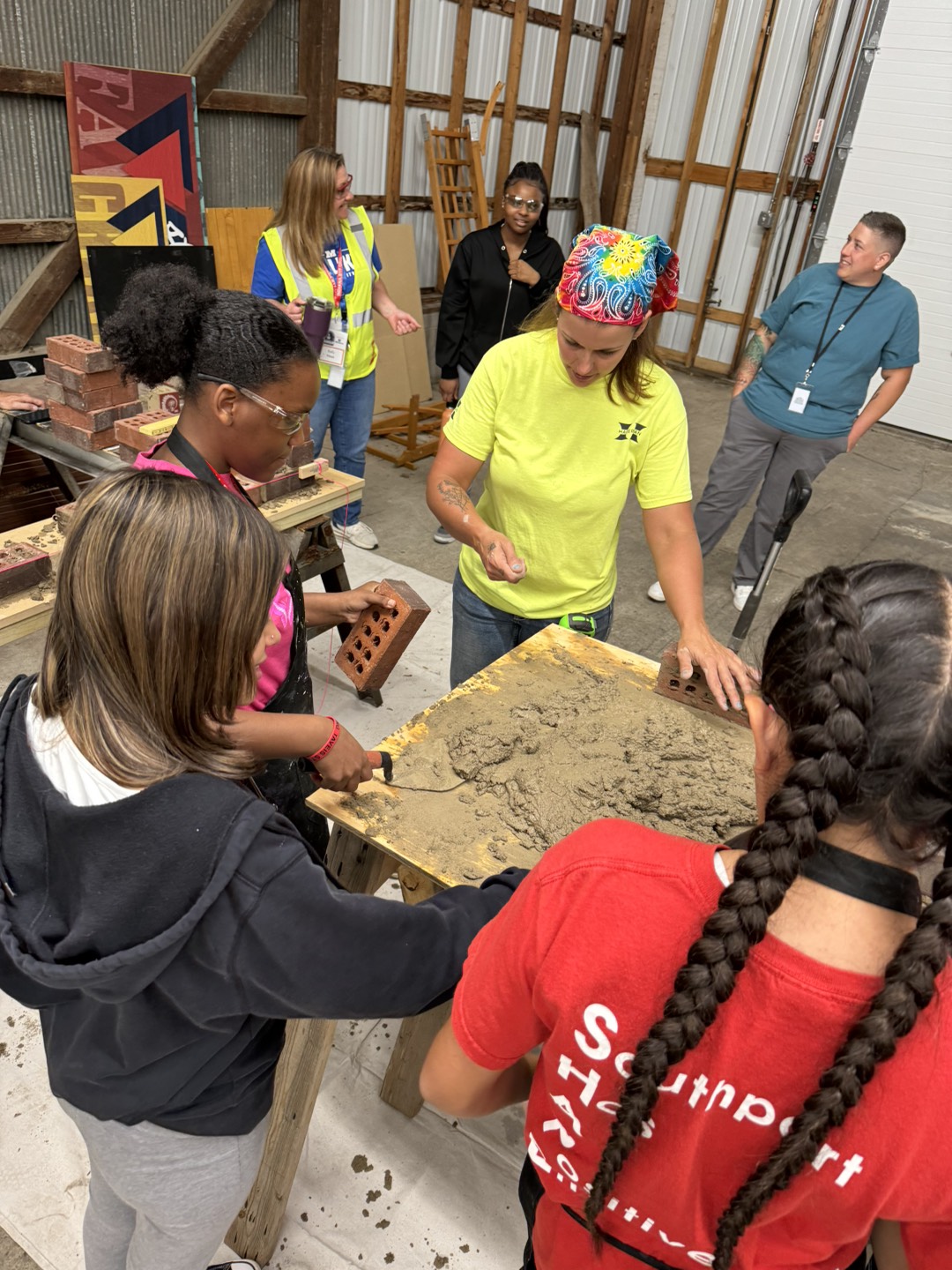8th graders participating in our Girls Construction Camp, learning about careers in construction, doing hands on projects, and learning from women in the trades. 