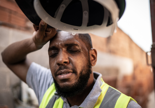Exhausted construction worker